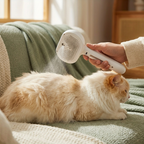 Spray grooming comb in use on cat