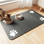 Cat eating from bowl on feeding mat