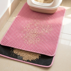 Overhead view of litter mat trapping granules