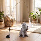 Kitten playing with feather wand suction toy
