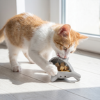 Kitten biting interactive treat dispenser toy